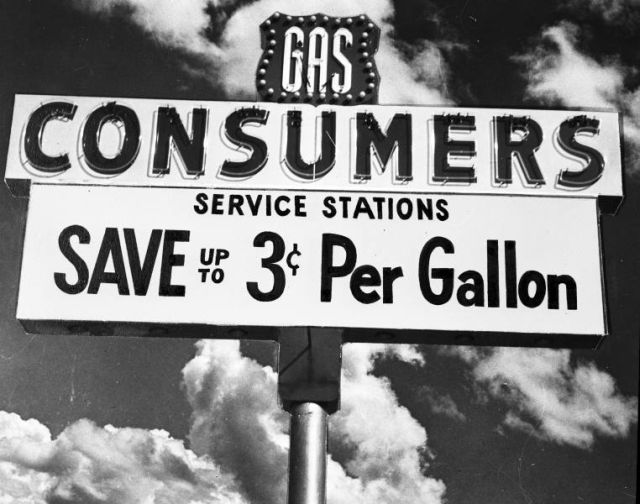 Advertising photograph of Consumers Service Station signage on February 2, 1961