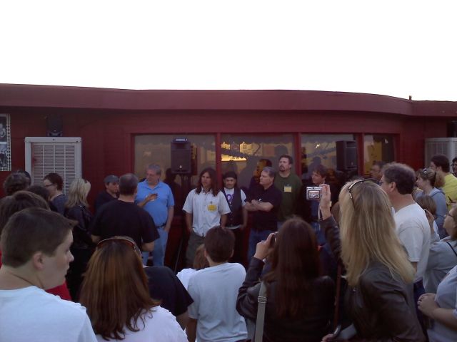 Filmmaker James Clarke with 'The Outsiders' extras and crew members at the Admiral Twin's 60th. Photo by Gaye Brown.